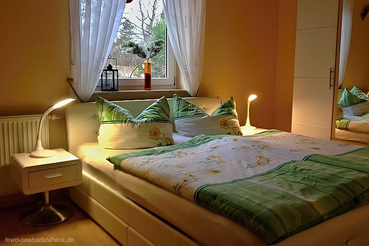 Schlafzimmer einer Ferienwohnung in Ahlbeck